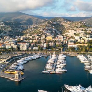 Sanremo, Italy. Aerial view of city port and skyline on a sunny afternoon