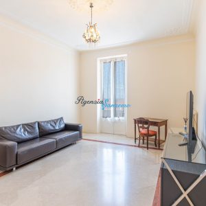 11595